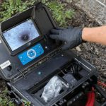 Inspection camera used for plumbing maintenance, showcasing underground view and operator controls at Maxwell-White Plumbing.